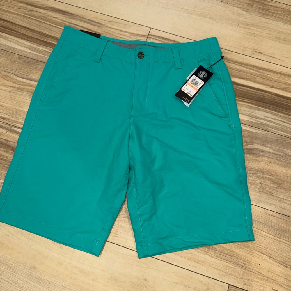 Under Armour Golf shorts size 34, 11” inseam. Brand new with tags.